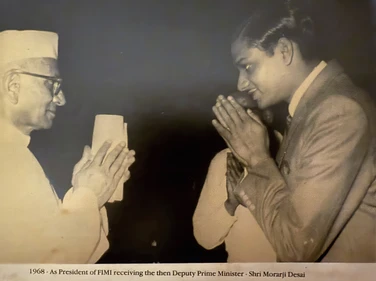 1968 photo: Dadu (Ajay Rungta), as FIMI President, greets DPM Morarji Desai with a namaste. Both in profile.
